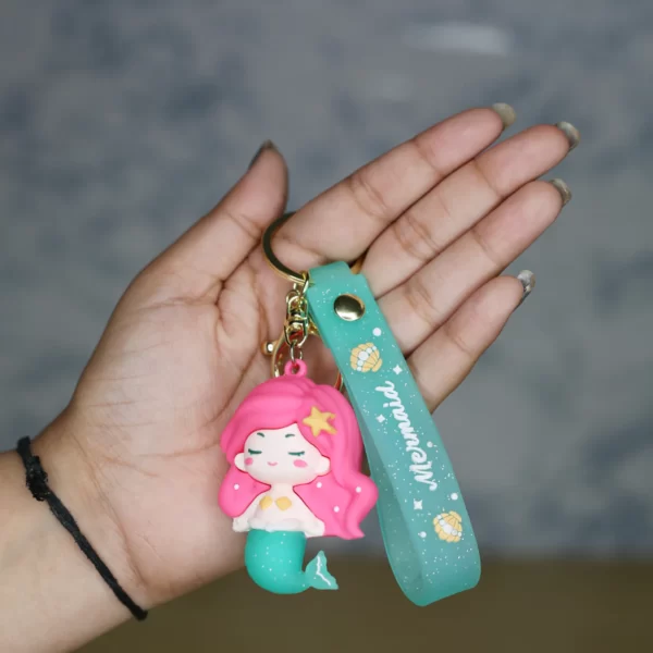 Mermaid Cartoon style keychain with band ( pink and green)